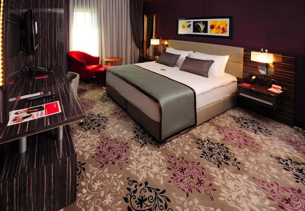 伊兹米特温德姆华美达广场酒店 科喀艾里 外观 照片 A room at the hotel